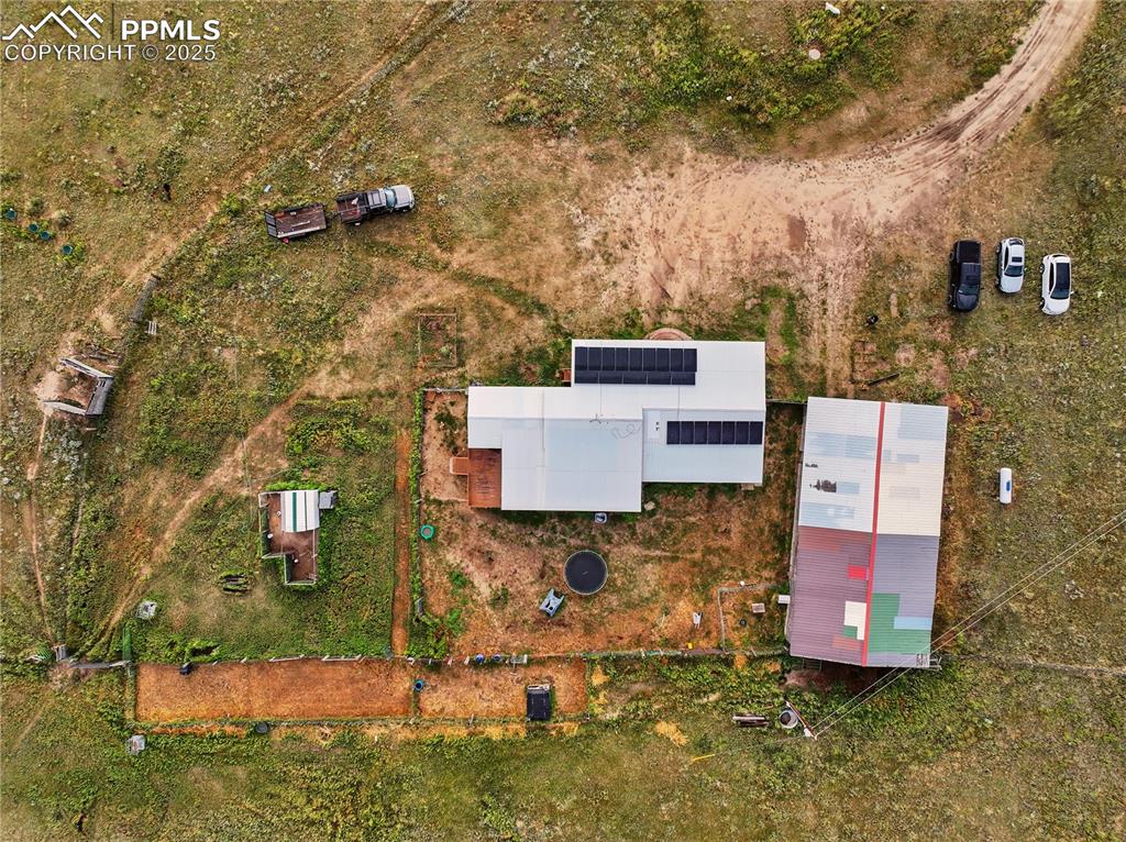 6615 Mulberry Road Calhan, CO 80808 - Photo 47 of 50 an aerial view of a house with a yard