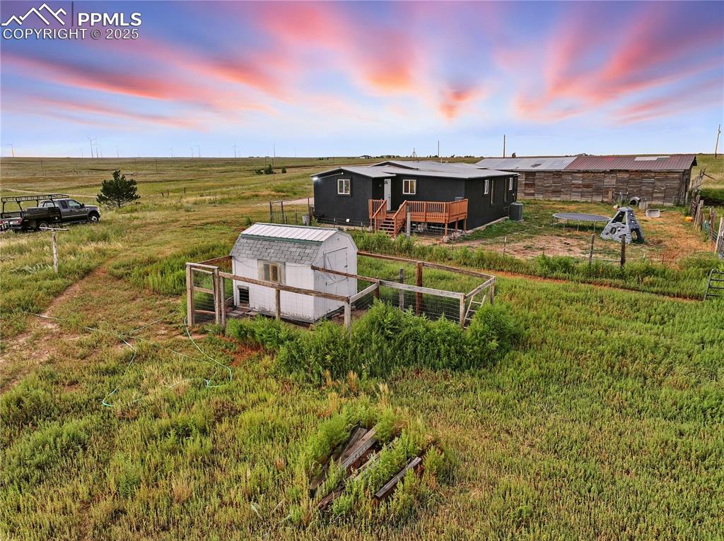 6615 Mulberry Road Calhan, CO 80808 - Photo 49 of 50 a view of a swimming pool with an ocean view