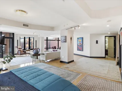 a living room with furniture and a table