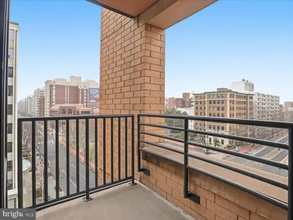 a view of a balcony with city view