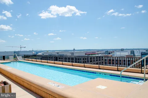 a view of balcony with furniture