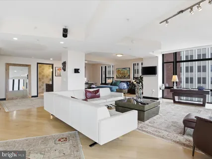 a living room with furniture and a table