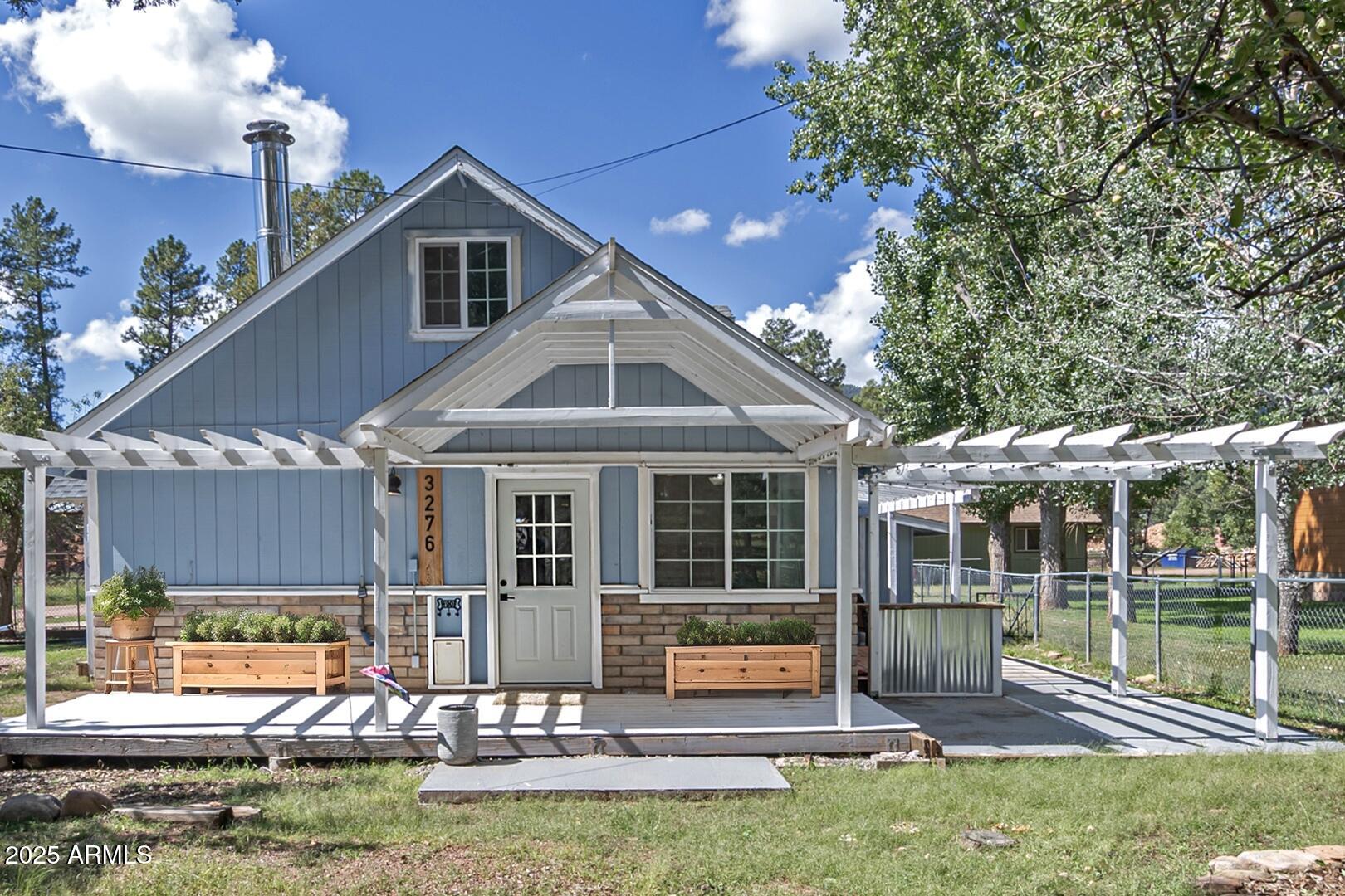 front view of a house with a yard