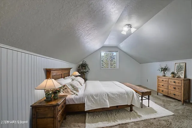 a living room with furniture and windows