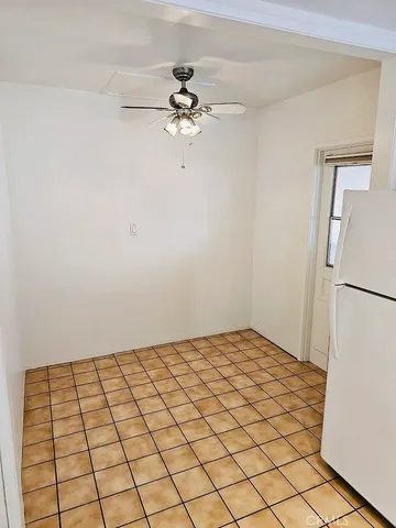 a view of a room with a flat screen tv