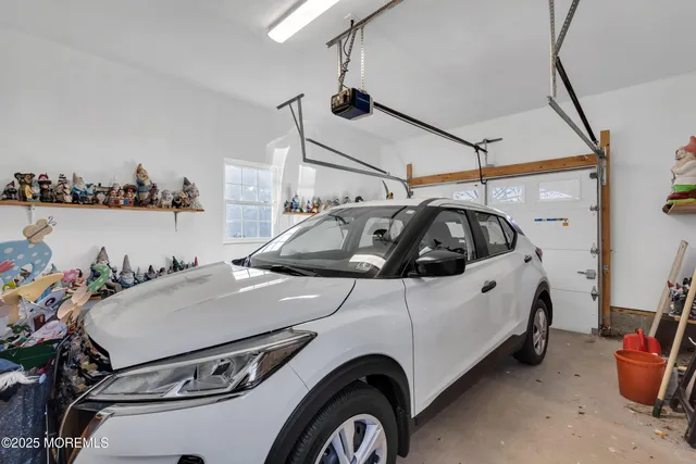 a view of a chairs and table in the patio deck