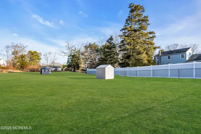 a view of a house with a big yard