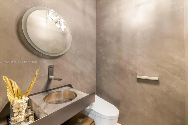 a bathroom with a bathtub and a sink