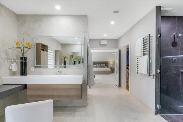 a kitchen with granite countertop a sink a window and counter top space