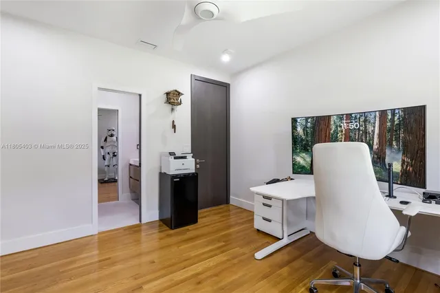 a view of a chairs and table in the patio
