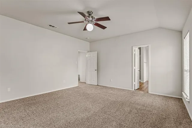a view of a livingroom with a ceiling fan