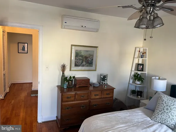 a close view of light fixtures and wooden floor