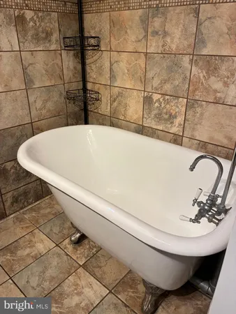 a bathroom with a toilet and a sink