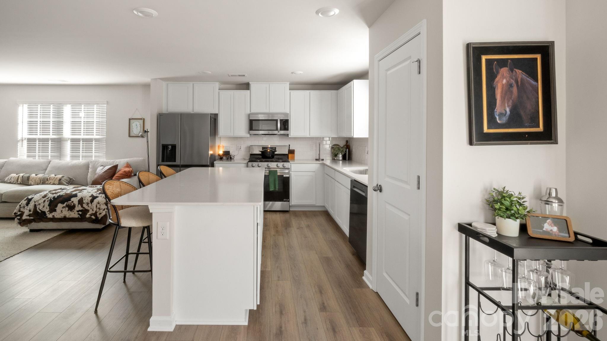 1615 Spring Edgemoor Sc 29712 Edgemoor, SC 29712 - Photo 11 of 30 a living room with furniture a flat screen tv and a refrigerator