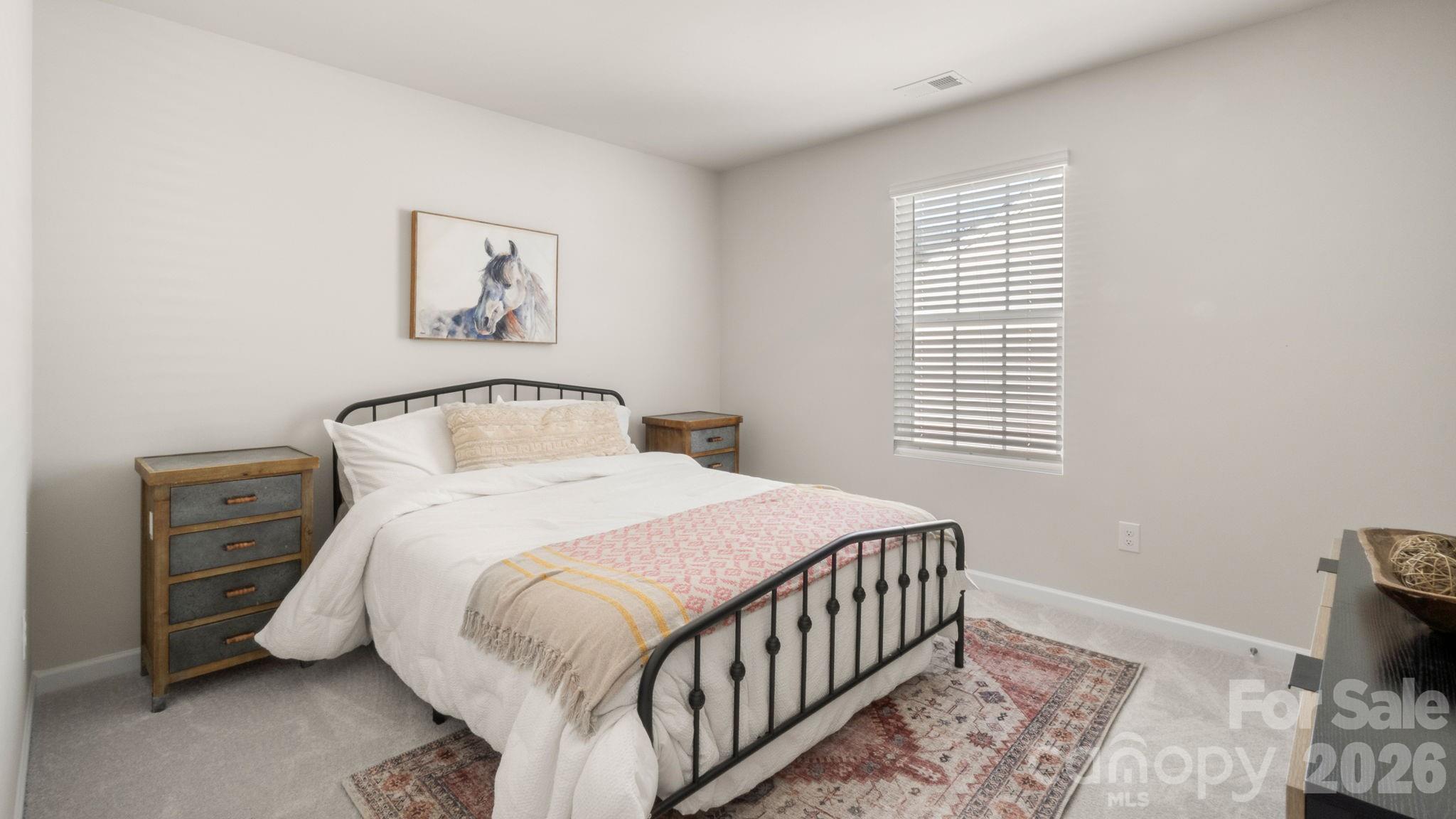 1615 Spring Edgemoor Sc 29712 Edgemoor, SC 29712 - Photo 26 of 30 a bedroom with a bed and a window