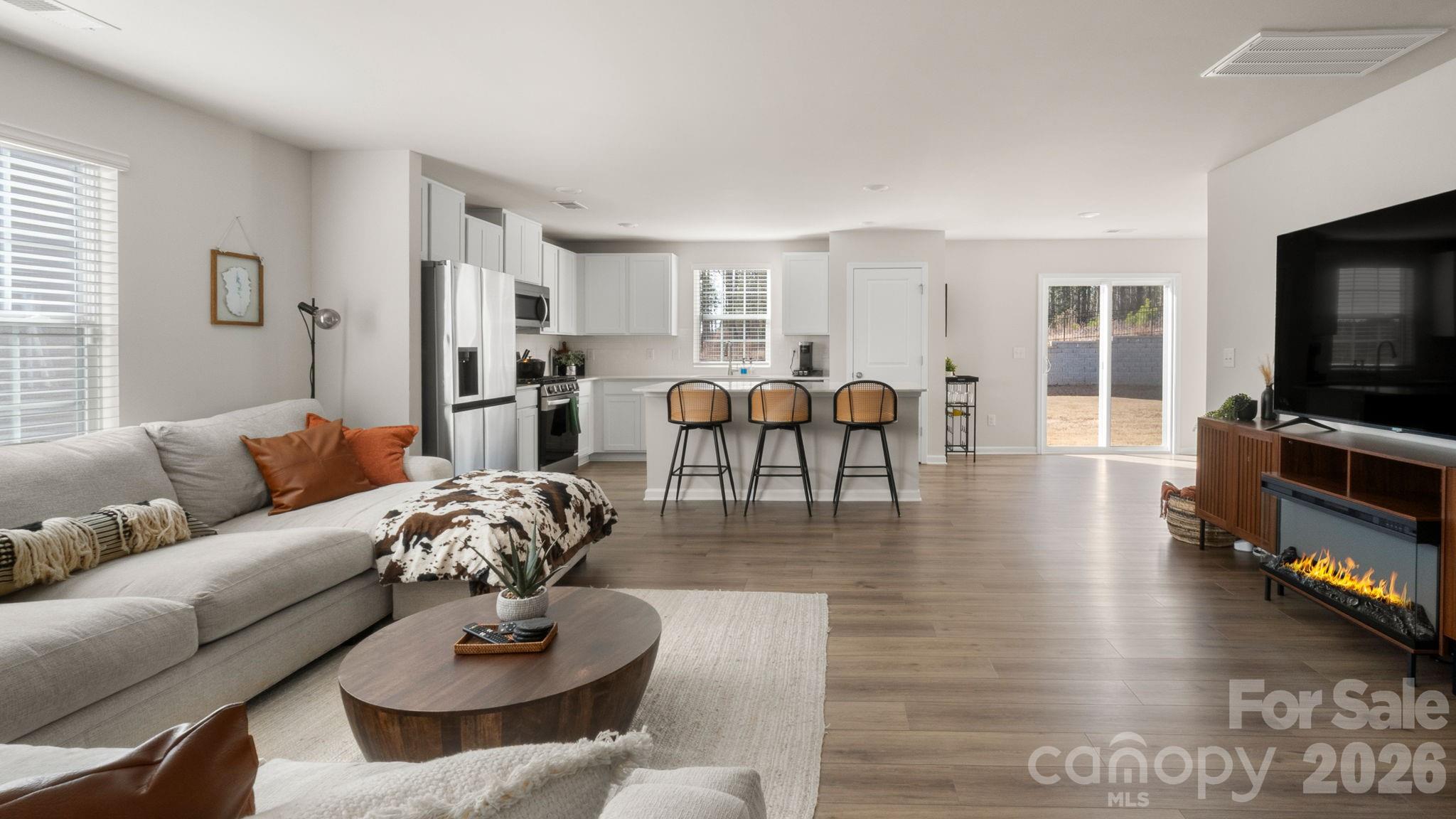1615 Spring Edgemoor Sc 29712 Edgemoor, SC 29712 - Photo 8 of 30 a living room with furniture flat screen tv and wooden floor