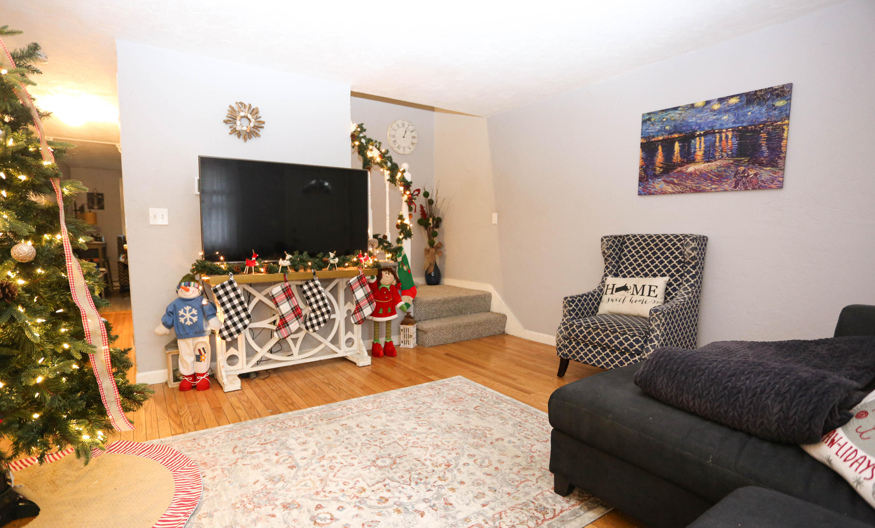 300 Falmouth Road, Unit 2C Mashpee, MA 02649 - Photo 6 of 17 a living room with furniture and a flat screen tv