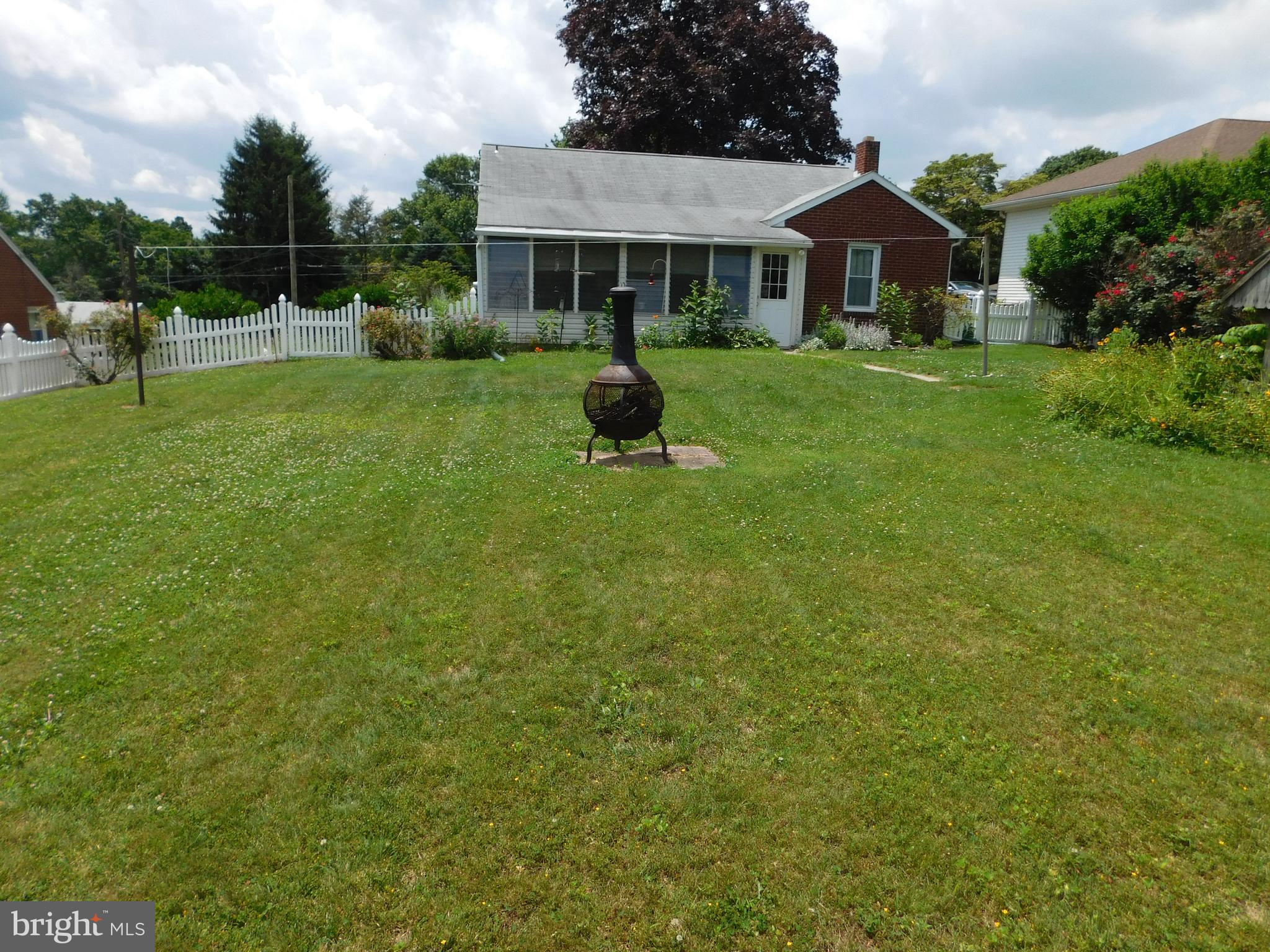 407 Chancellor Road York, PA 17403 - Photo 2 of 30 Large level fenced-in rear yard-fencing is vinyl