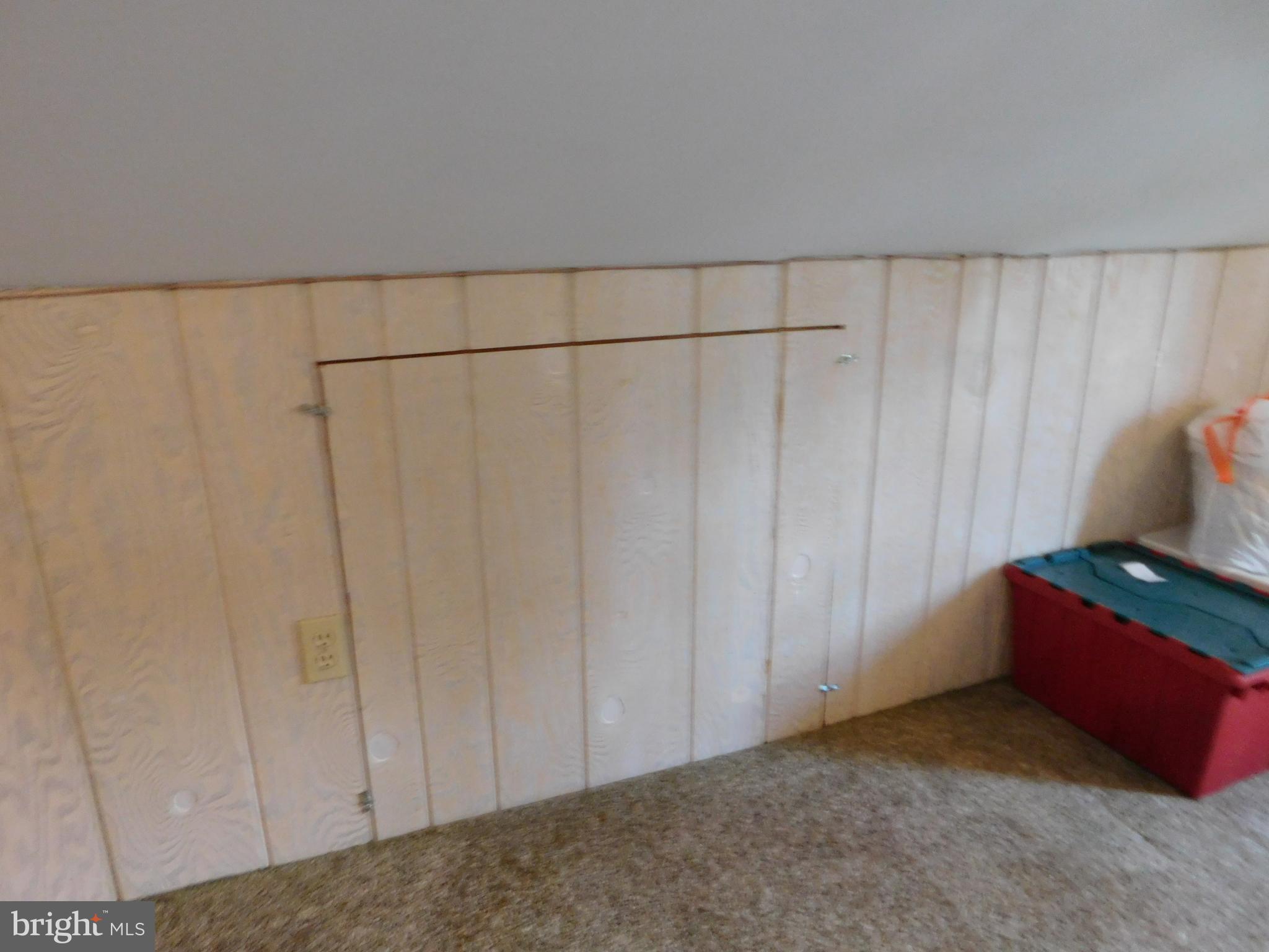 407 Chancellor Road York, PA 17403 - Photo 23 of 30 Access to storage area under the eaves in 2nd fl