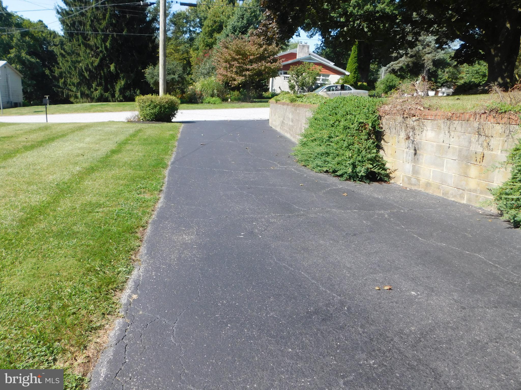 407 Chancellor Road York, PA 17403 - Photo 5 of 30 Large long driveway with parking for 6 cars