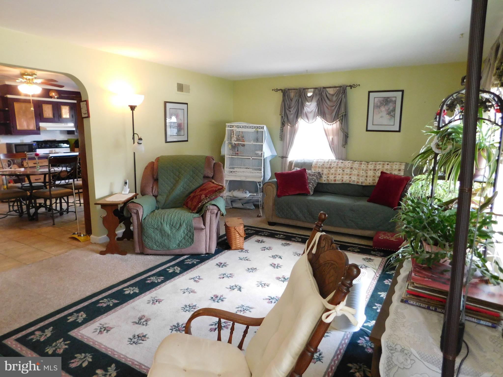 407 Chancellor Road York, PA 17403 - Photo 7 of 30 Living room has large archway leading to the kit