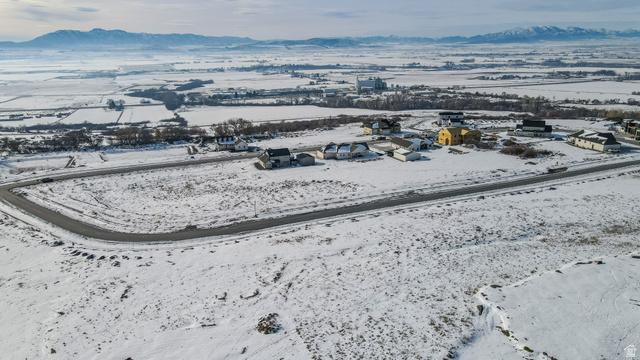 669 Cherry Ridge Lane, Unit 47 Richmond, UT 84333 - Photo 6 of 6 Snowy aerial view with a mountain view