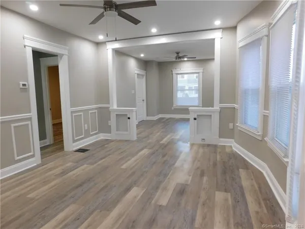 a view of an empty room and window