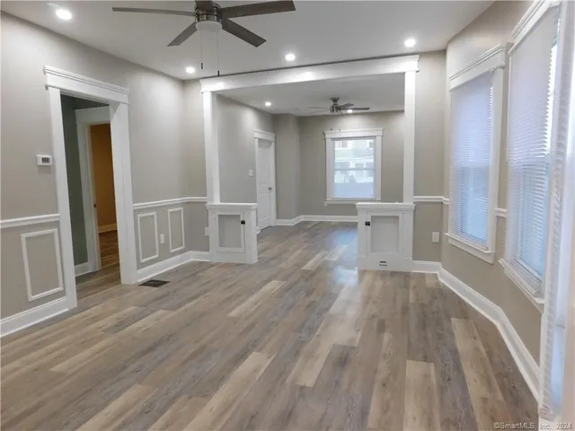 a view of an empty room and window