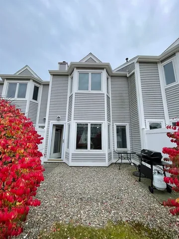 a view of house with a big yard