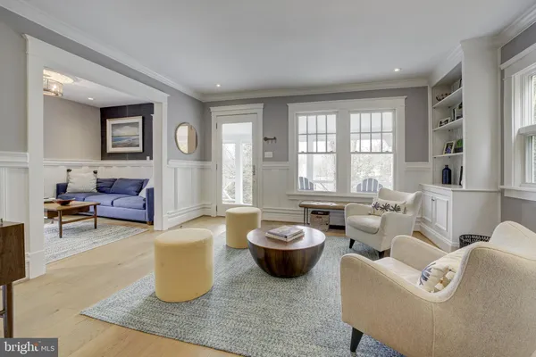 a living room with furniture and window