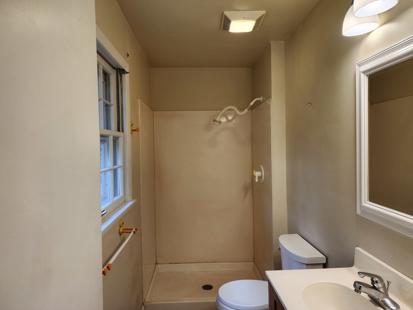 1825 Crescent Drive Champaign, IL 61821 - Photo 13 of 24 a bathroom with a sink toilet and shower