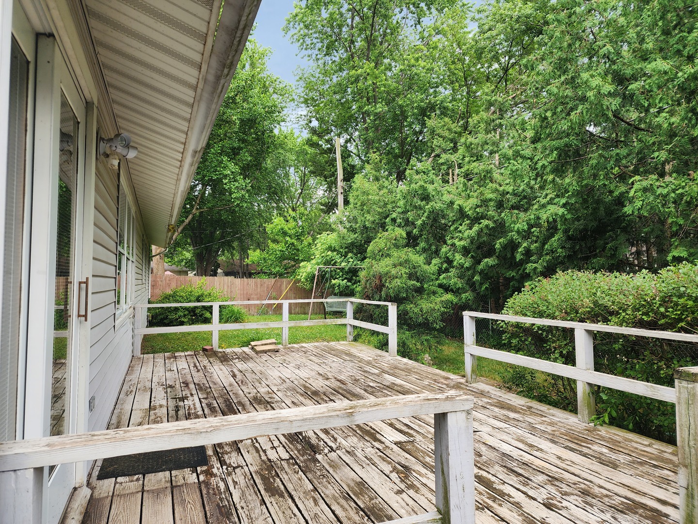 1825 Crescent Drive Champaign, IL 61821 - Photo 18 of 24 a view of deck with wooden floor and seating space