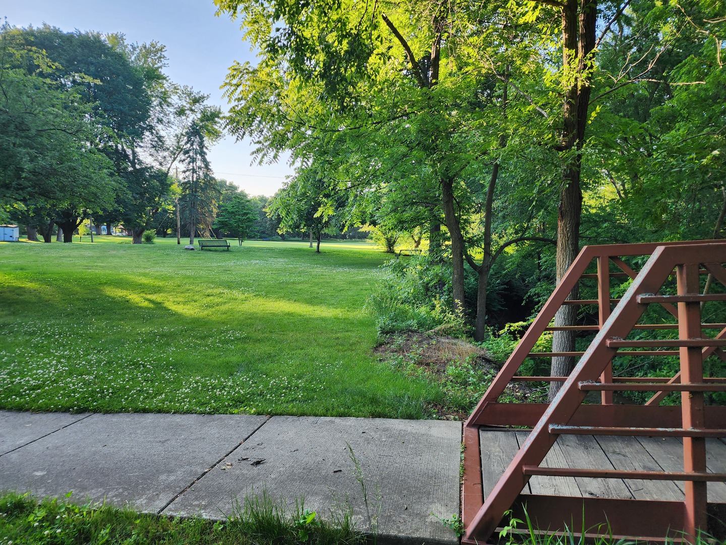 1825 Crescent Drive Champaign, IL 61821 - Photo 22 of 24 a backyard of a house with lots of green space