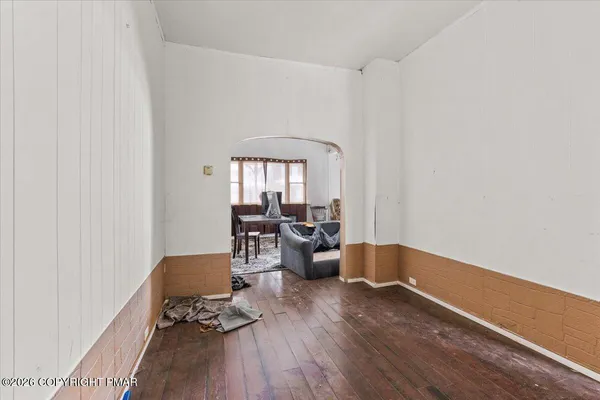 a living room with furniture and a area