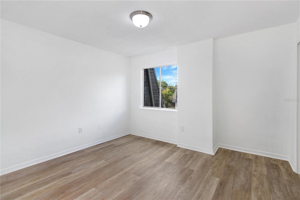 1946 South Conway Road, Unit 4 Orlando, FL 32812 - Photo 11 of 20 an empty room with a window