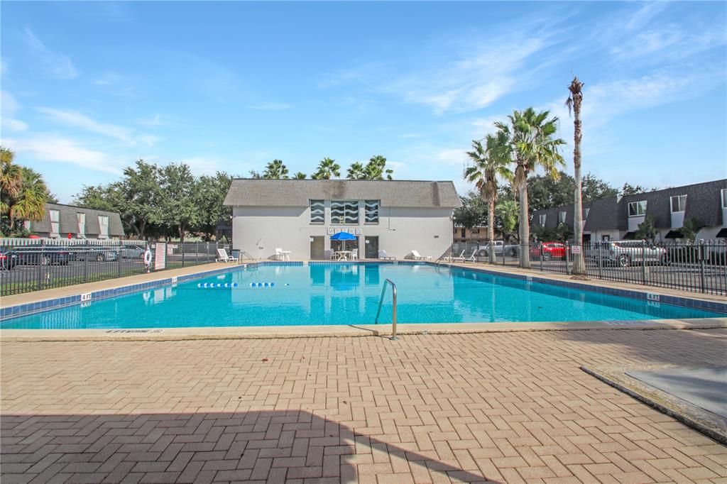 1946 South Conway Road, Unit 4 Orlando, FL 32812 - Photo 18 of 20 a view of outdoor space with a swimming pool