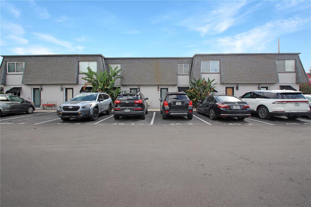 1946 South Conway Road, Unit 4 Orlando, FL 32812 - Photo 20 of 20 a cars parked in front of a room