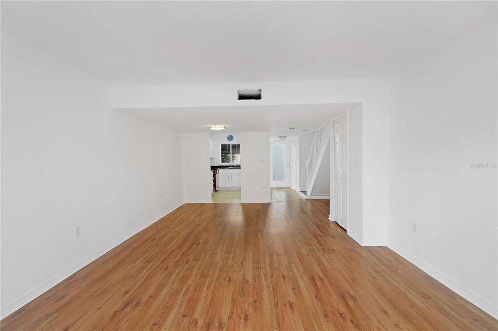 1946 South Conway Road, Unit 4 Orlando, FL 32812 - Photo 5 of 20 a view of empty room with wooden floor