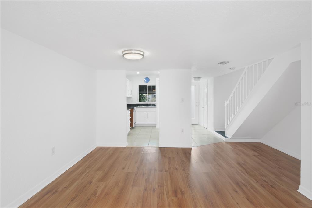 1946 South Conway Road, Unit 4 Orlando, FL 32812 - Photo 7 of 20 a view of empty room with wooden floor