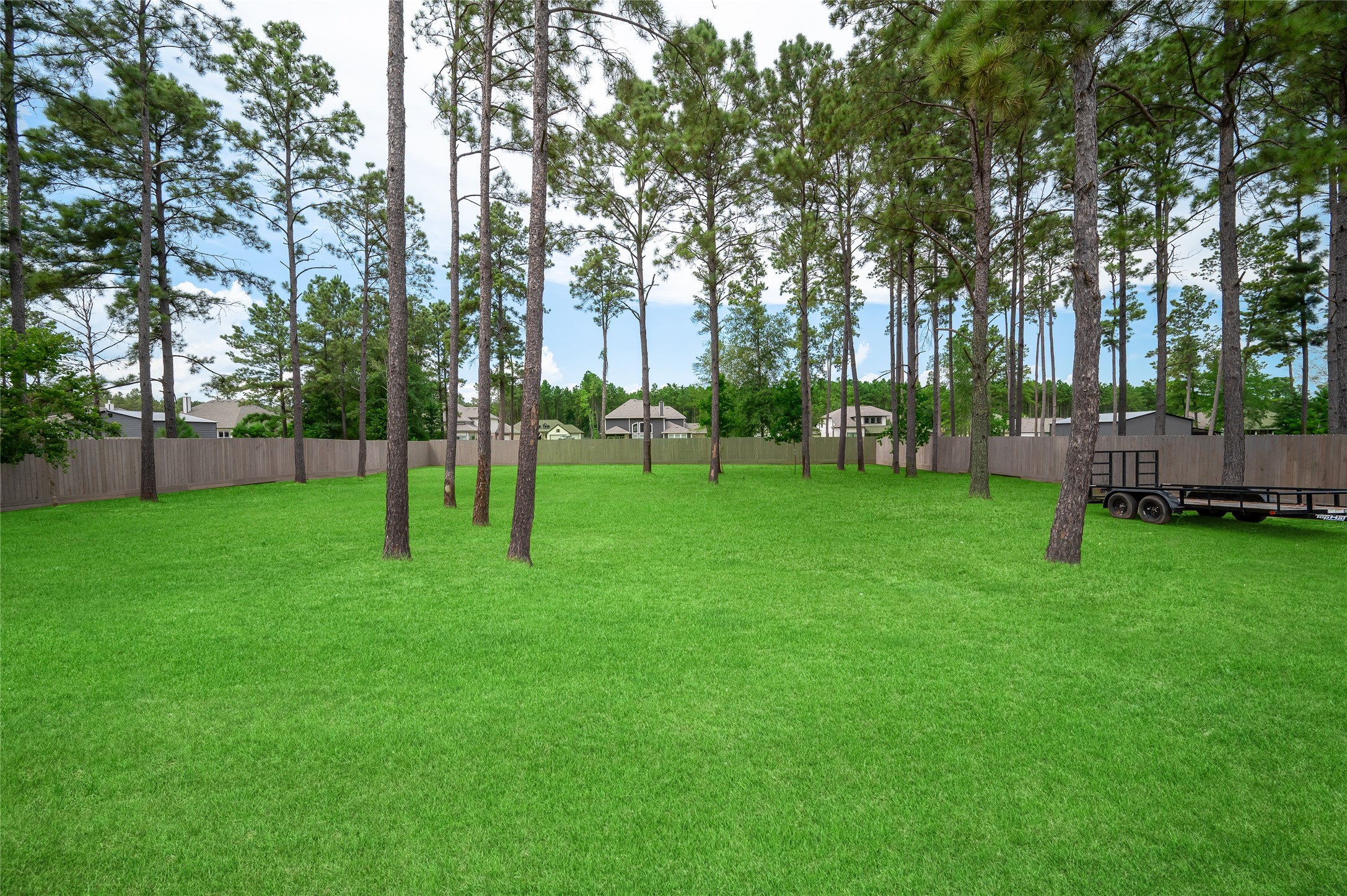 13419 Maverick Trail Road Conroe, TX 77303 - Photo 40 of 49 Spacious backyard with several mature trees that is fully fenced.
