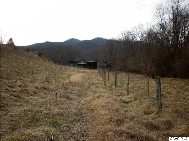 High Peak Road Monroe, VA 24574 - Photo 1 of 4 a view of a dry yard with mountains in the background