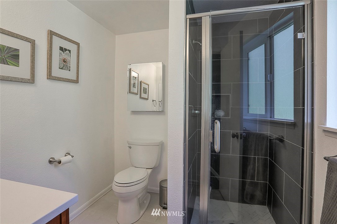 21314 2nd Avenue Southeast Bothell, WA 98021 - Photo 14 of 25 a bathroom with a toilet and a sink