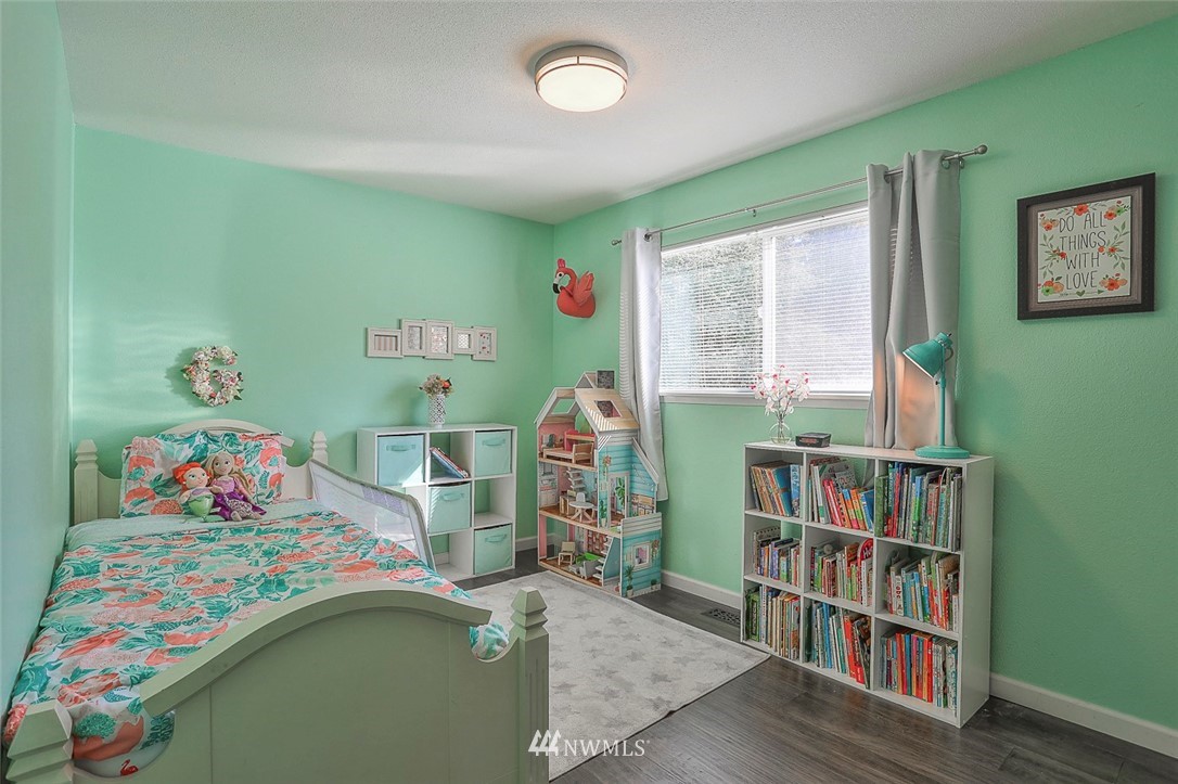 21314 2nd Avenue Southeast Bothell, WA 98021 - Photo 19 of 25 a room with toys and a wooden floor