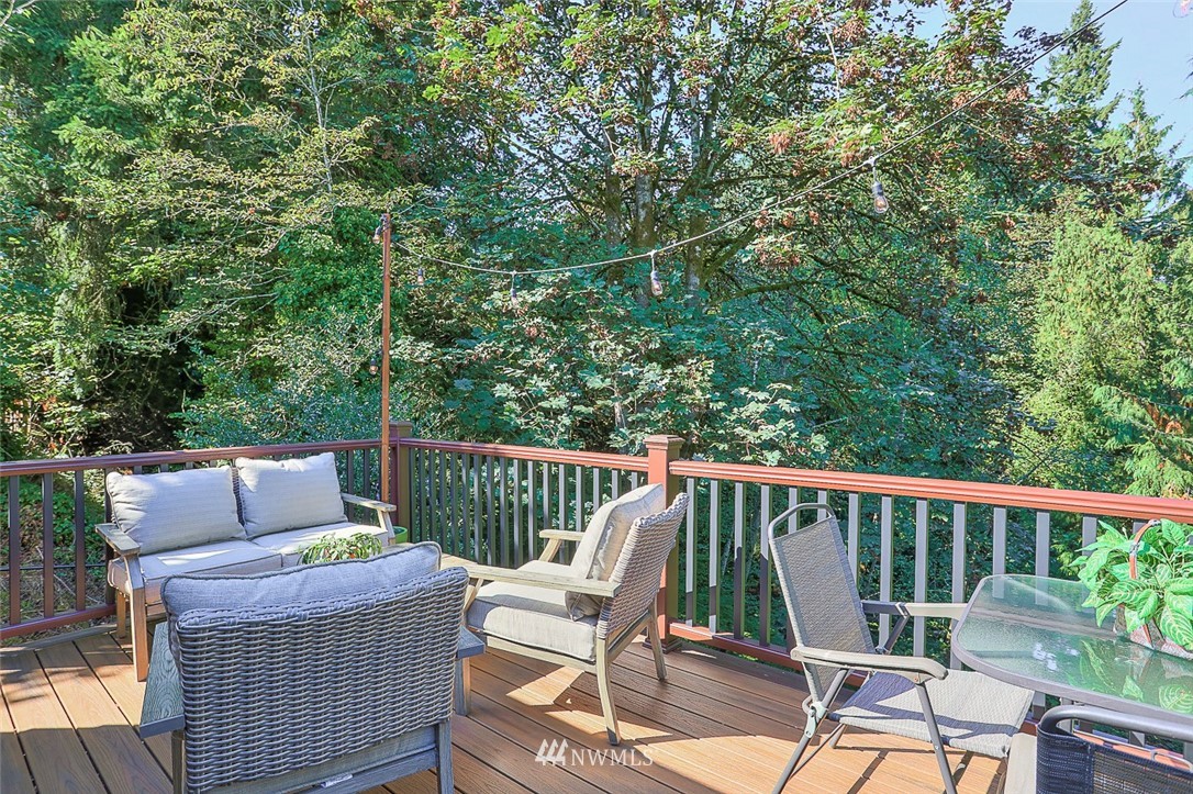 21314 2nd Avenue Southeast Bothell, WA 98021 - Photo 25 of 25 a view of roof deck with chairs and wooden fence
