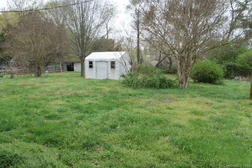 116 Terrace Road Mooresville, NC 28117 - Photo 3 of 12 a view of a tiny house with a yard