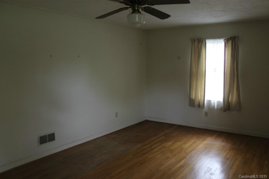 116 Terrace Road Mooresville, NC 28117 - Photo 6 of 12 an empty room with a window