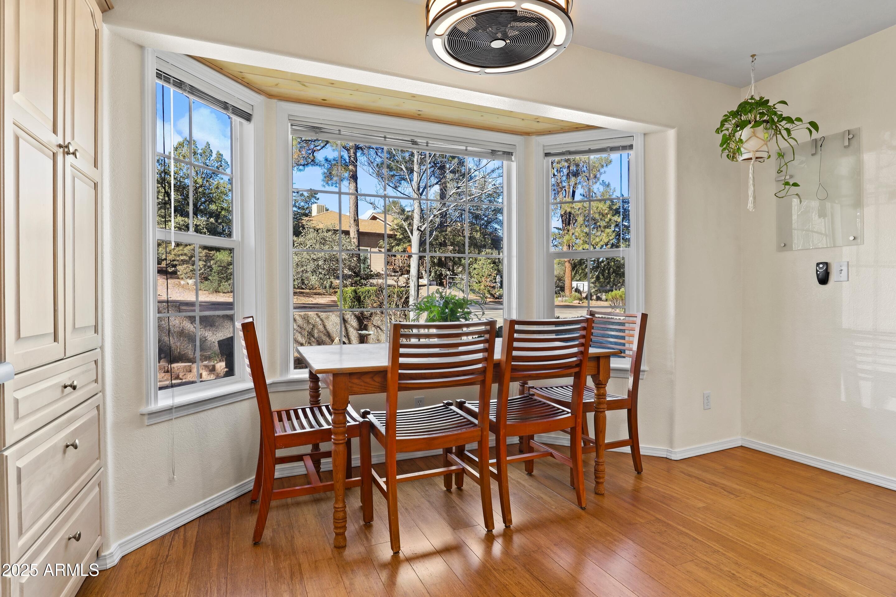905 South Coronado Way Payson, AZ 85541 - Photo 11 of 33 a dining room with furniture entryway and wooden floor