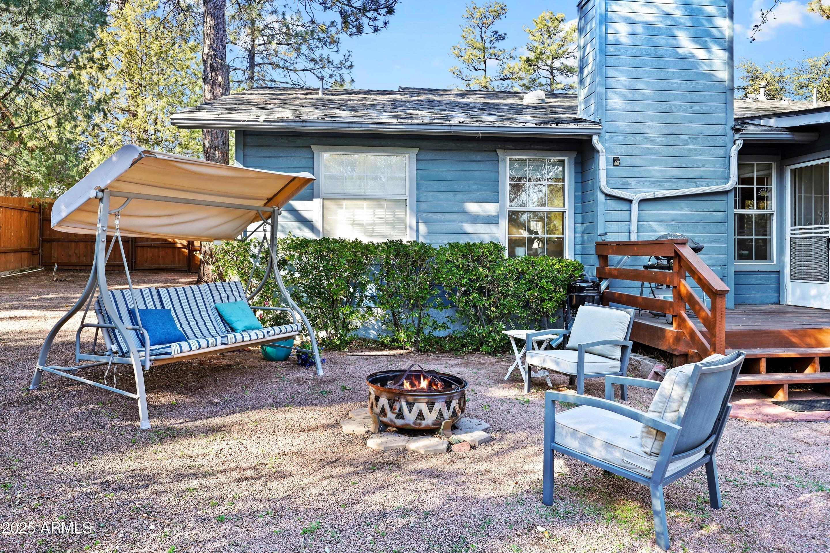 905 South Coronado Way Payson, AZ 85541 - Photo 25 of 33 a view of backyard with outdoor seating barbeque oven table and chairs