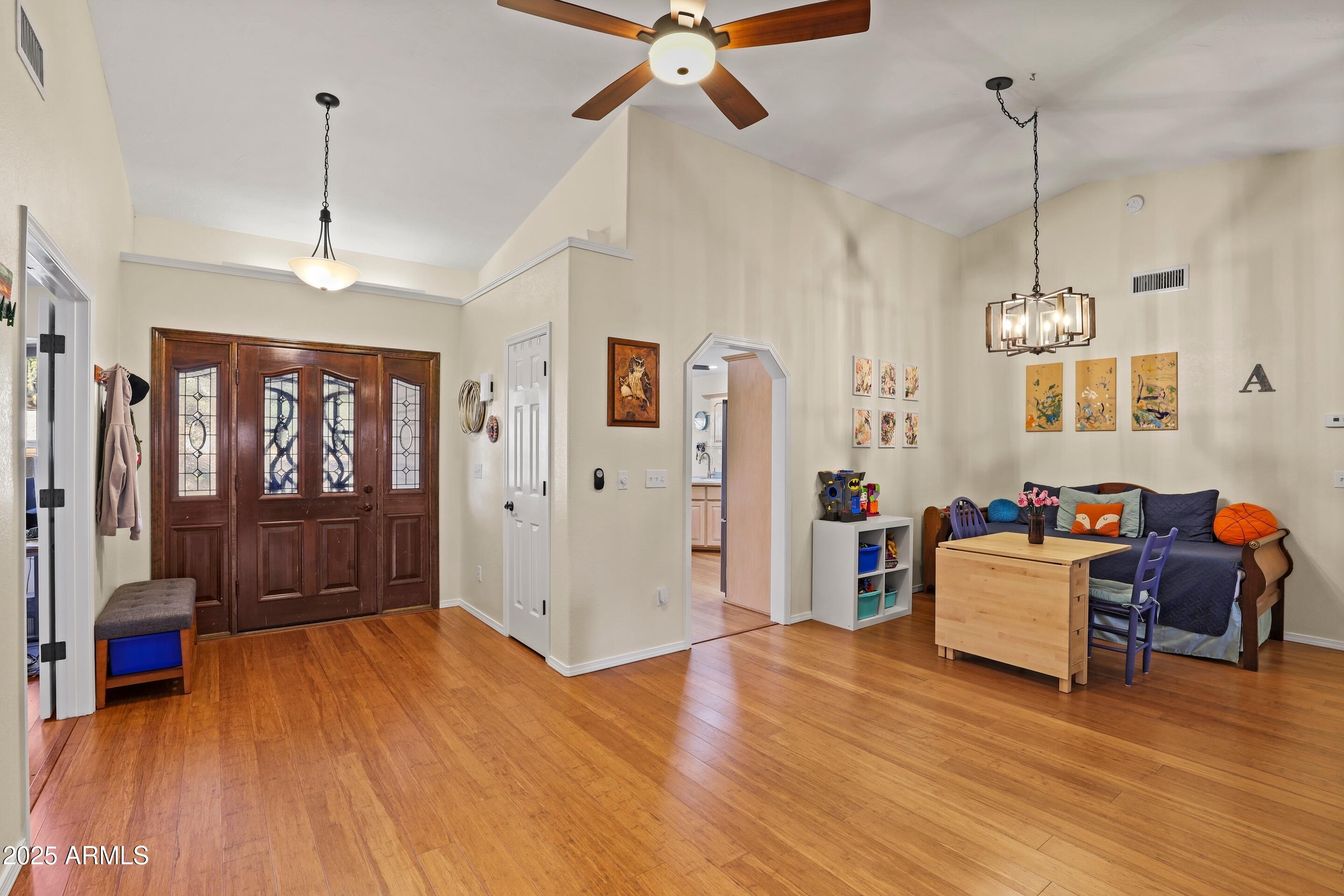 905 South Coronado Way Payson, AZ 85541 - Photo 3 of 33 a living room with furniture and wooden floor