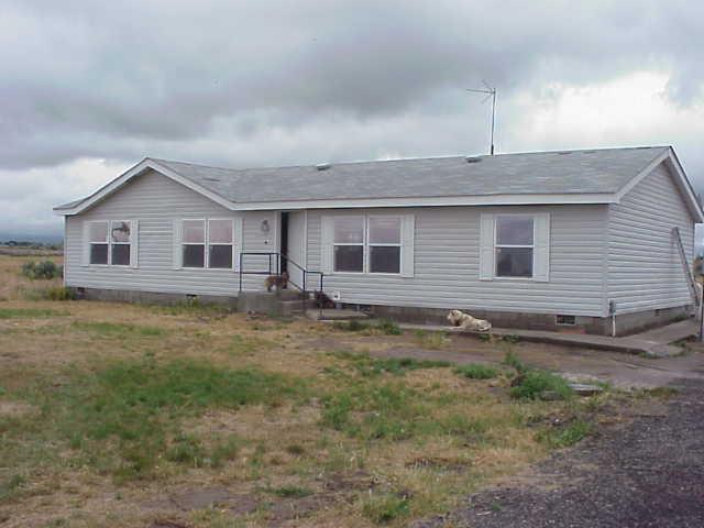 2903 South Griffin Road Prosser, WA 99350 - Photo 1 of 1 a view of a house with a yard